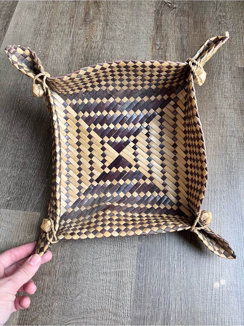 Hand woven natural fiber basket tray two toned knotted corners